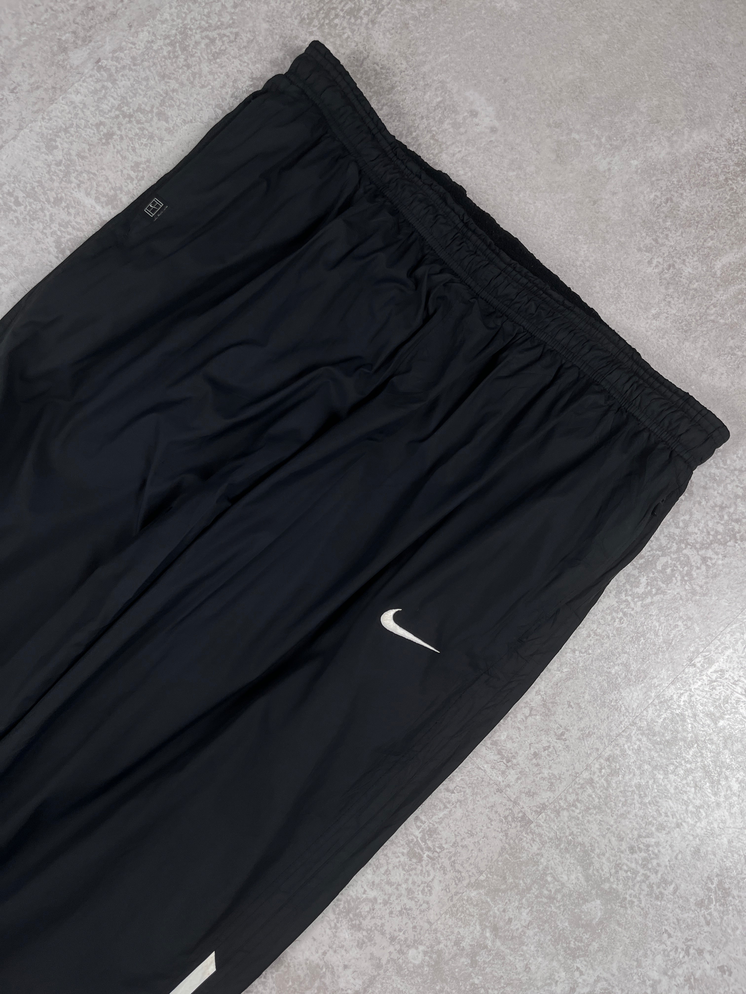 Nike Trackpants 10‘s (L)